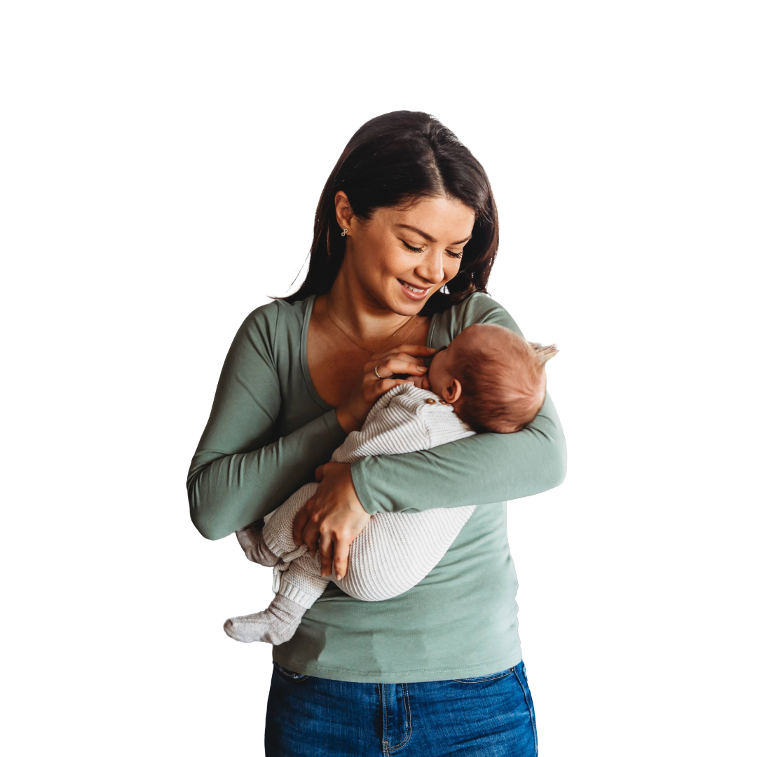 Mother closely holds infant and adjusts pacifier.