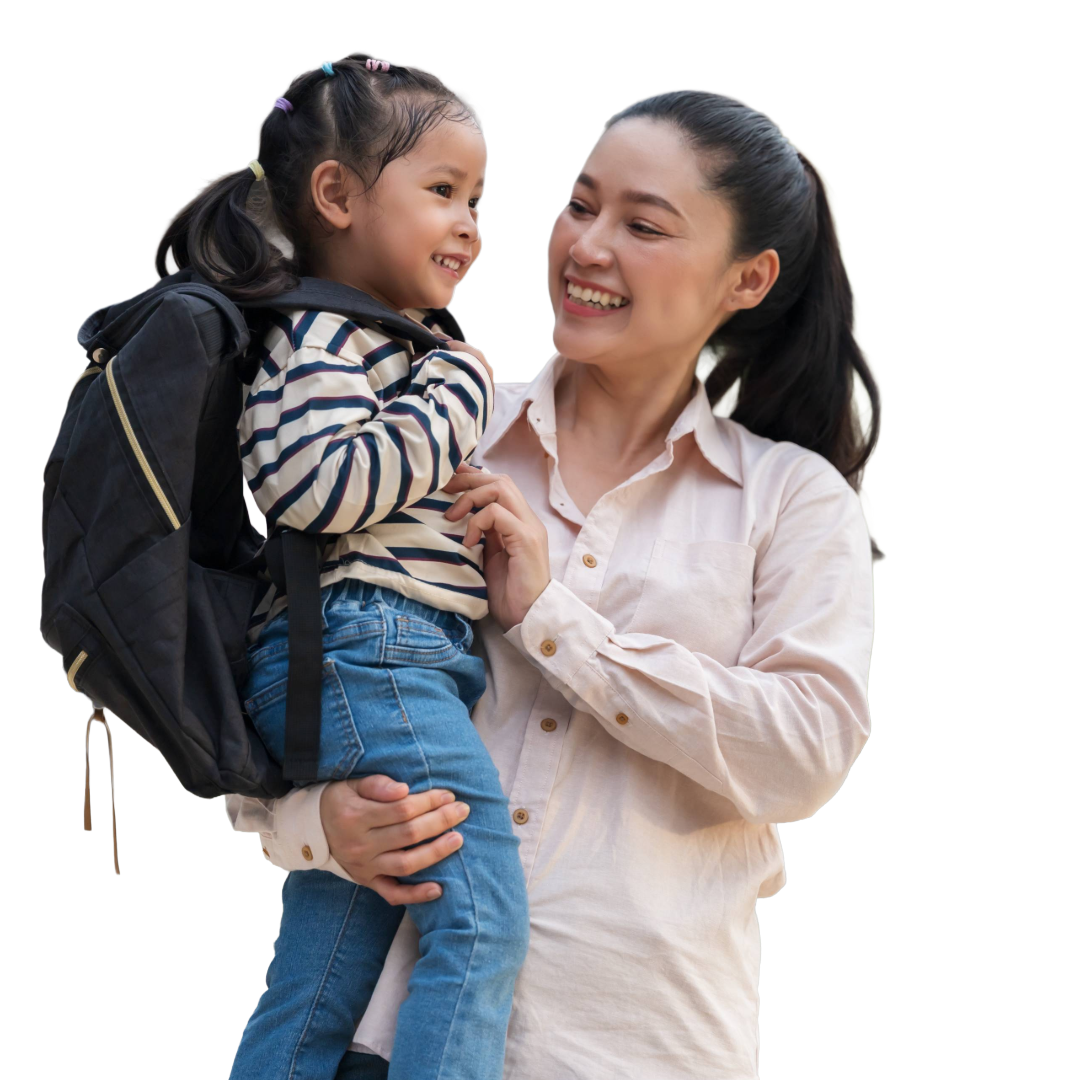Smiling mother hold young child wearing a backpack.